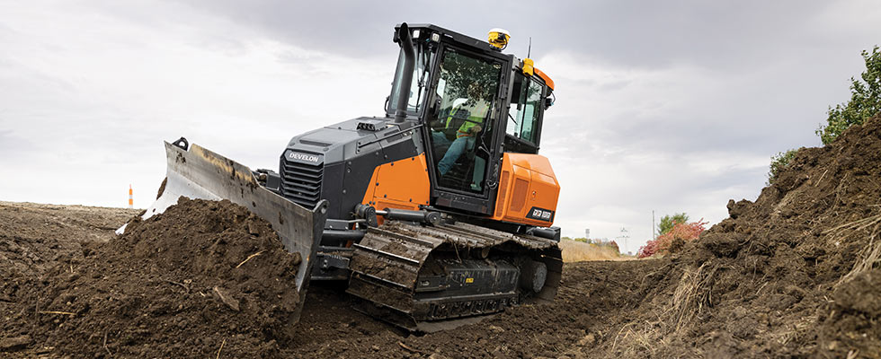 Tracked dozer working on construction site