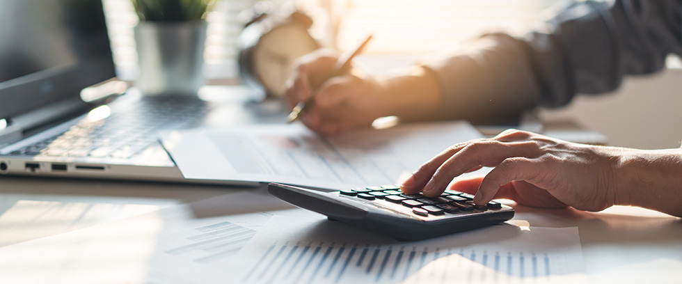 Business professionals reviewing financial documents