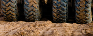 heavy equipment tires on dirt