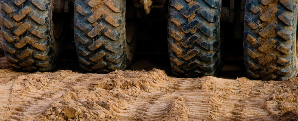 heavy equipment tires on dirt
